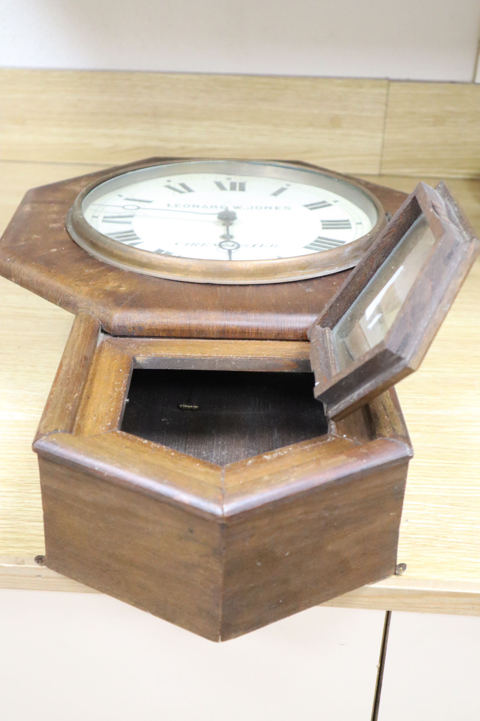 A late 19th century wall timepiece marked Leonard W. Jones, Cirencester, length 59cm